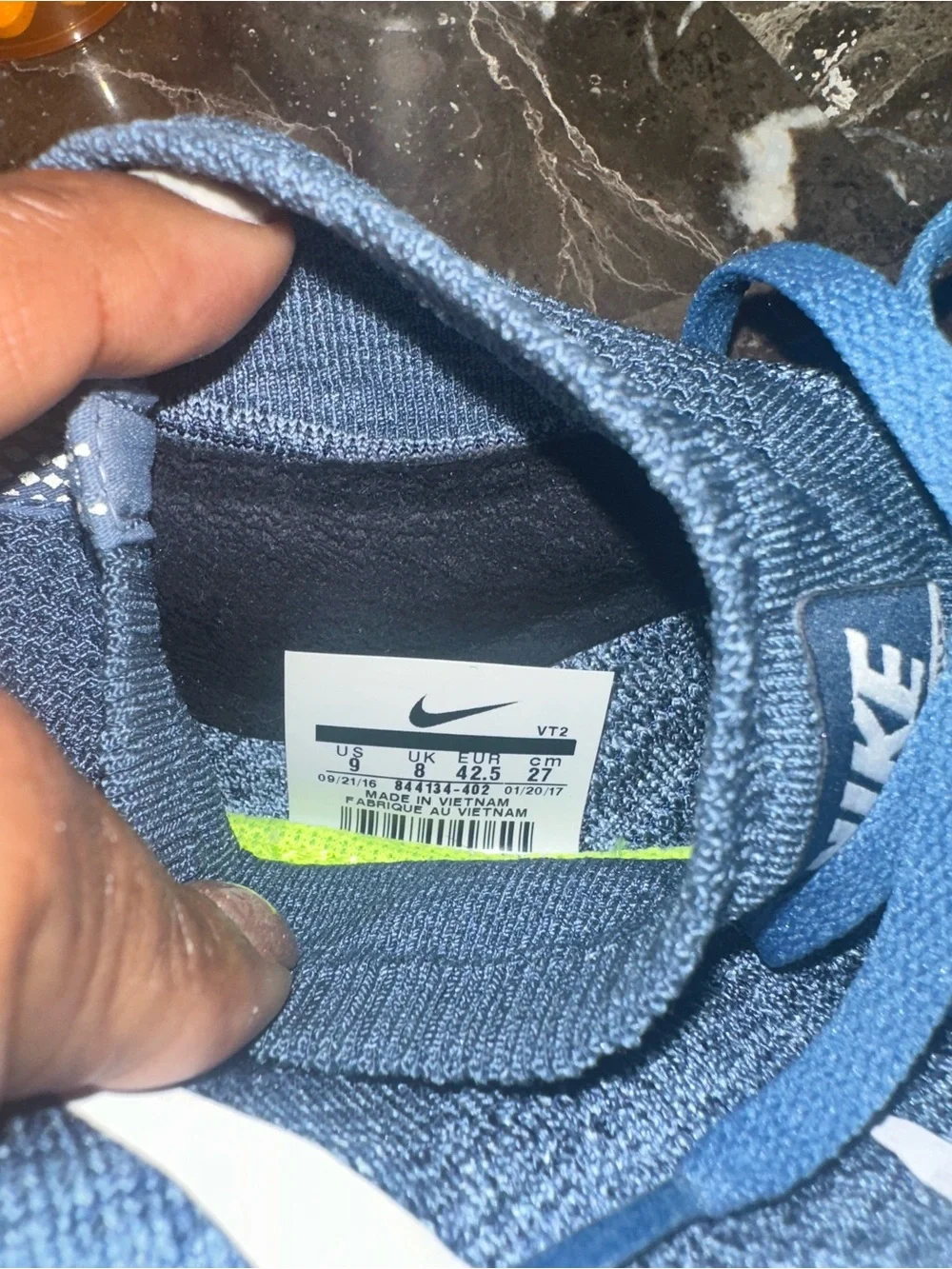 Nike Men’s Blue Flyknit Mid-Top Sneakers with White Swoosh